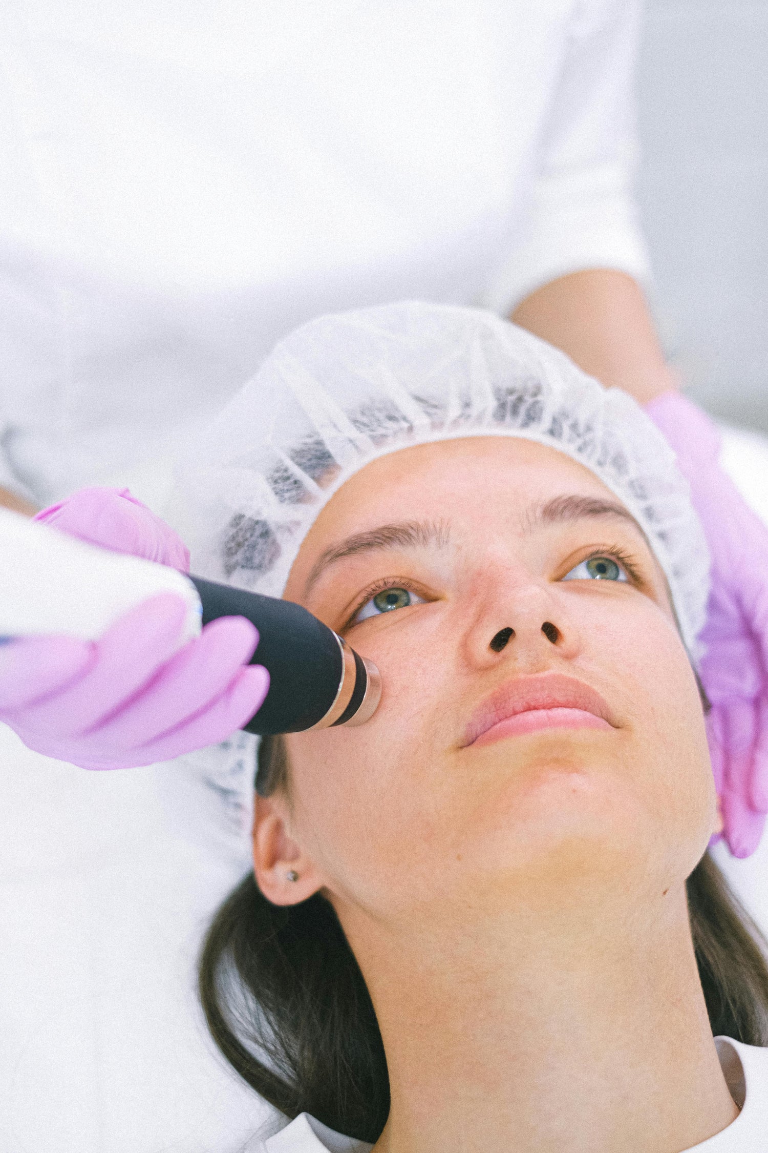 A woman receives treatment at a med spa on premium spa equipment