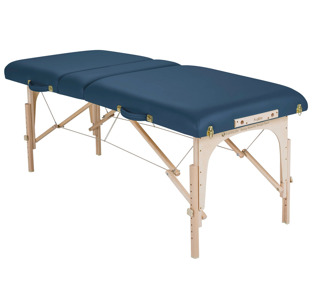 Earthlite Avalon XD Tilt Top portable massage table in mystic blue laying flat