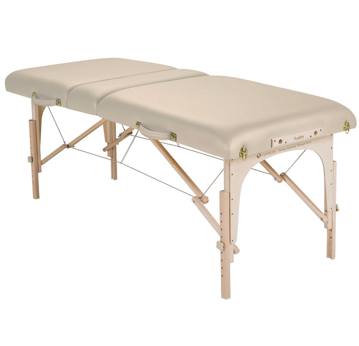 Earthlite Avalon XD Tilt Top portable massage table in light creme laying flat
