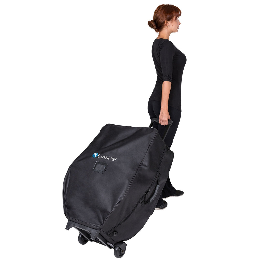 Massage therapist rolling Earthlite Avila II portable massage chair in carrying case.