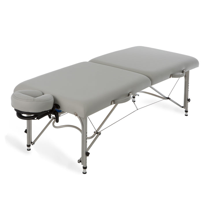 Earthlite Luna portable massage table with aluminum frame and light grey upholstery